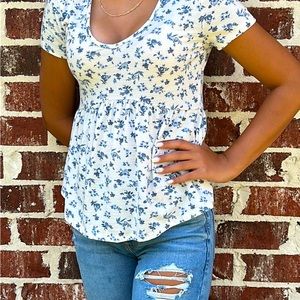 White blouse with blue flowers